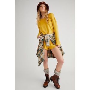 Free People long sleeve open back romper